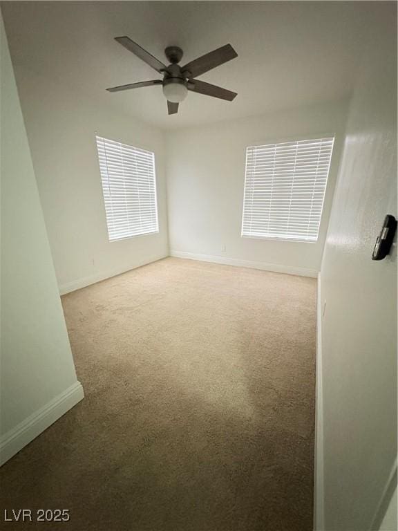 5040 Jacarilla Ln, North Las Vegas, NV 89031 - unfurnished room featuring carpet floors, baseboards, and ceiling fan