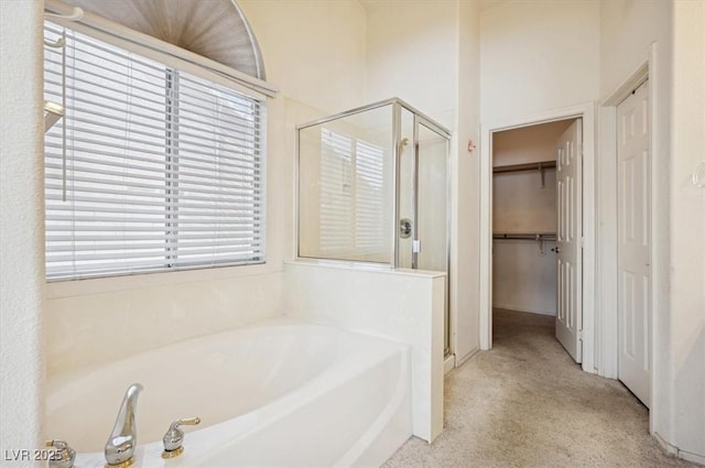 4323 Village Spring St, Las Vegas, NV 89147 - bathroom featuring a shower stall and a garden tub