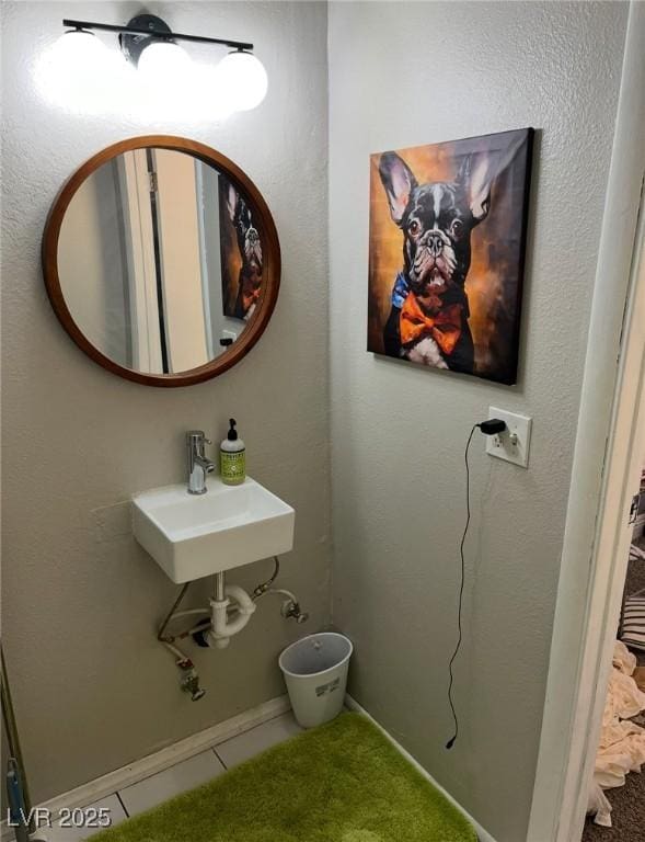 2855 Rice St, Logandale, NV 89021 - bathroom featuring a sink and tile patterned flooring