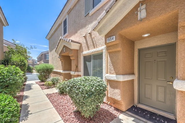 1554 Ward Frontier Ln, Henderson, NV 89002 - property entrance featuring stucco siding