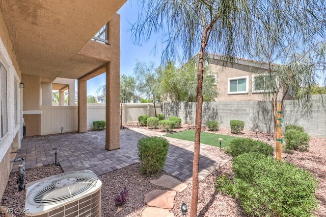 1554 Ward Frontier Ln, Henderson, NV 89002 - fenced backyard with central air condition unit and a patio