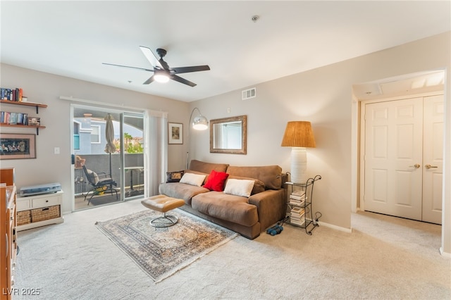6955 N Durango Dr Unit 3013, Las Vegas, NV 89149 - carpeted living room featuring ceiling fan and baseboards