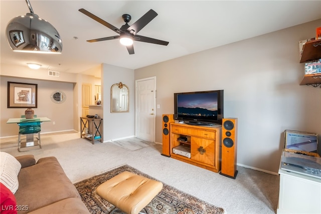 6955 N Durango Dr Unit 3013, Las Vegas, NV 89149 - living room with a ceiling fan, carpet floors, and baseboards
