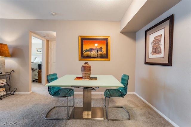6955 N Durango Dr Unit 3013, Las Vegas, NV 89149 - carpeted dining space featuring baseboards