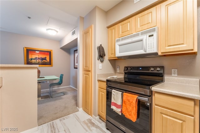 6955 N Durango Dr Unit 3013, Las Vegas, NV 89149 - kitchen featuring stainless steel electric stove, white microwave, light brown cabinetry, and light countertops
