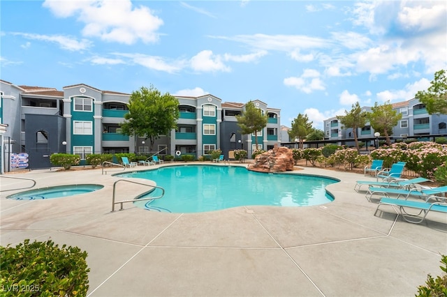 6955 N Durango Dr Unit 3013, Las Vegas, NV 89149 - community pool with a patio area, a residential view, and a community hot tub