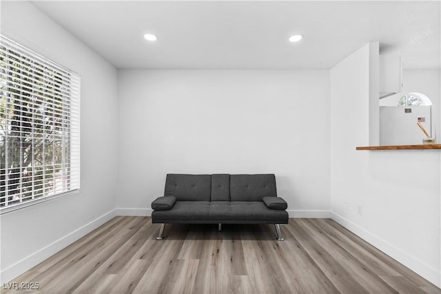 3923 Gogo Way Unit 106, Las Vegas, NV 89103 - living area featuring wood finished floors, baseboards, and recessed lighting