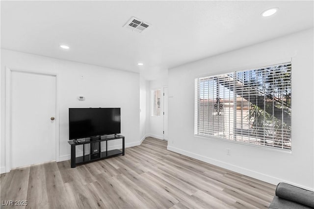 3923 Gogo Way Unit 106, Las Vegas, NV 89103 - unfurnished living room with wood finished floors, recessed lighting, and baseboards