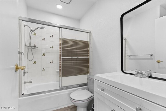 3923 Gogo Way Unit 106, Las Vegas, NV 89103 - full bathroom with toilet, bath / shower combo with glass door, vanity, and recessed lighting