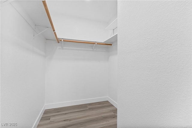 3923 Gogo Way Unit 106, Las Vegas, NV 89103 - spacious closet featuring wood finished floors
