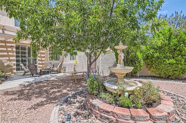 1667 Sabatini Dr, Henderson, NV 89052 - view of yard featuring a patio area