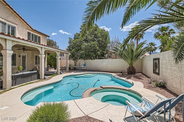 1667 Sabatini Dr, Henderson, NV 89052 - view of swimming pool featuring a ceiling fan, a fenced backyard, an outdoor living space, a pool with connected hot tub, and a patio area