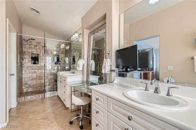1667 Sabatini Dr, Henderson, NV 89052 - full bathroom with a stall shower, lofted ceiling, two vanities, and tile patterned flooring