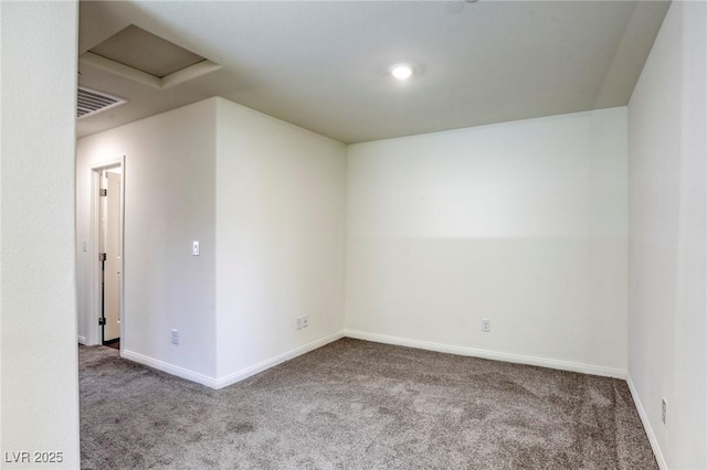 12728 Feathersong St, Henderson, NV 89044 - empty room with carpet, attic access, and baseboards