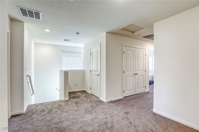 12728 Feathersong St, Henderson, NV 89044 - empty room with carpet floors, attic access, baseboards, and a smoke detector