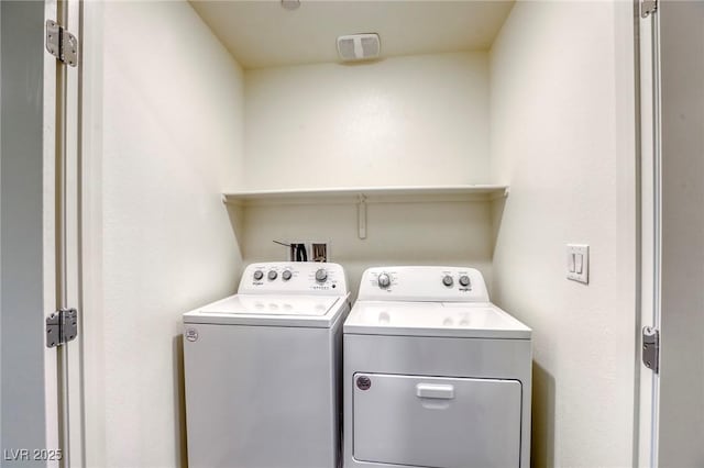 12728 Feathersong St, Henderson, NV 89044 - laundry room with separate washer and dryer