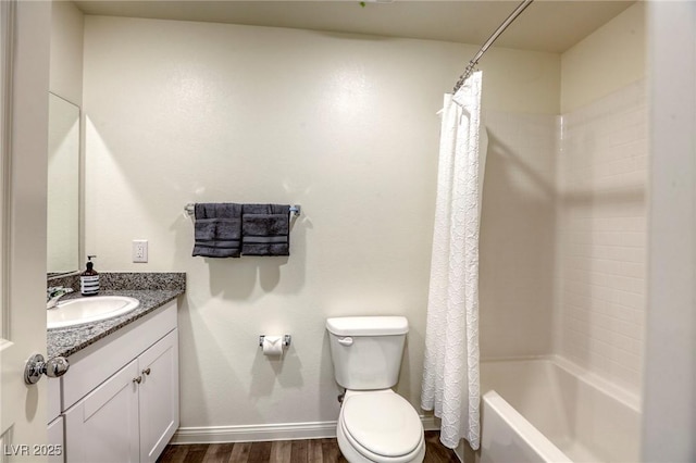 12728 Feathersong St, Henderson, NV 89044 - full bathroom featuring wood finished floors, vanity, toilet, shower / bath combo, and baseboards