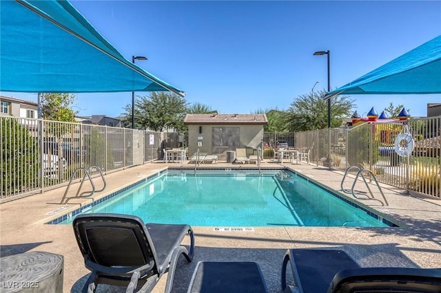 12728 Feathersong St, Henderson, NV 89044 - community pool with a patio