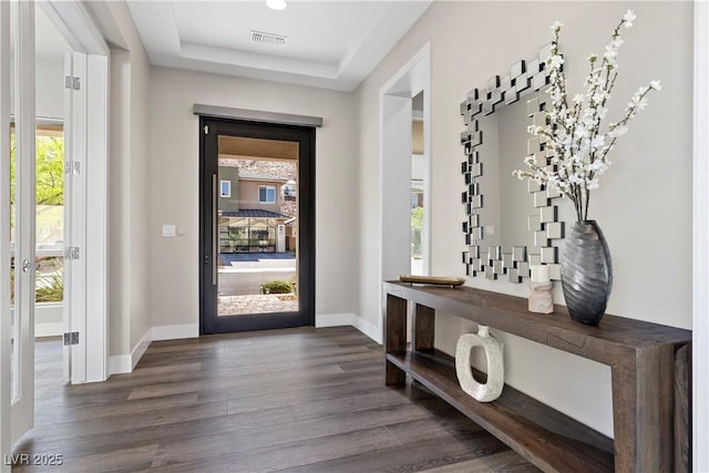 2890 Reverence Heights Ln, Las Vegas, NV 89138 - foyer entrance featuring dark wood finished floors, baseboards, a raised ceiling, and recessed lighting