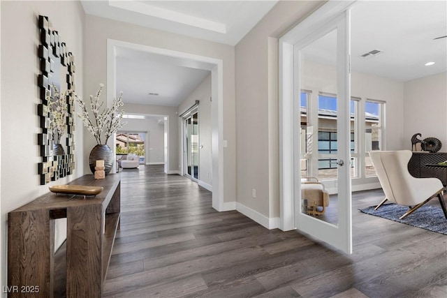 2890 Reverence Heights Ln, Las Vegas, NV 89138 - hallway with french doors, dark wood-style flooring, and baseboards
