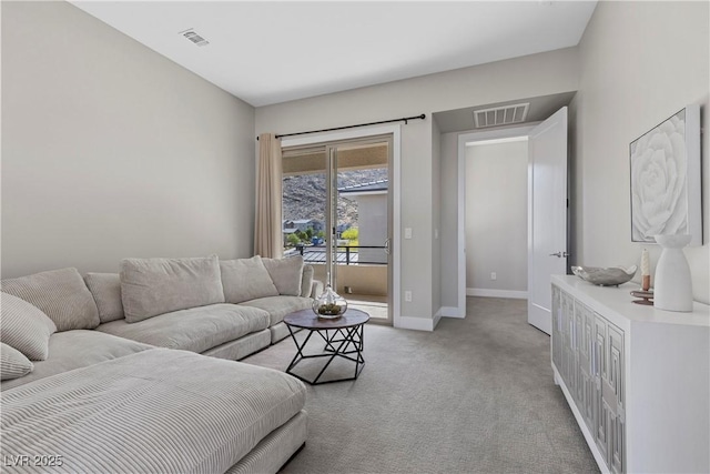 2890 Reverence Heights Ln, Las Vegas, NV 89138 - living room featuring baseboards and light colored carpet