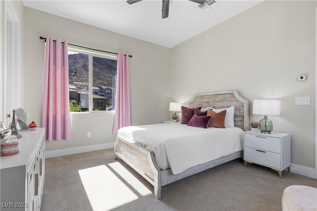 2890 Reverence Heights Ln, Las Vegas, NV 89138 - bedroom with light colored carpet, baseboards, and a ceiling fan