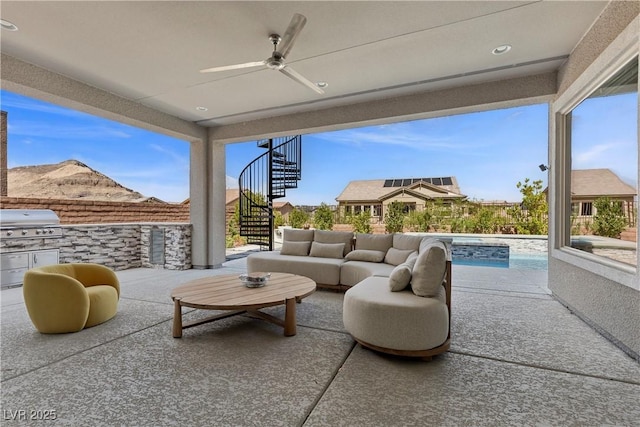 2890 Reverence Heights Ln, Las Vegas, NV 89138 - view of patio with stairs, ceiling fan, and outdoor lounge area