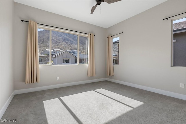 2890 Reverence Heights Ln, Las Vegas, NV 89138 - unfurnished room featuring carpet, a ceiling fan, and baseboards