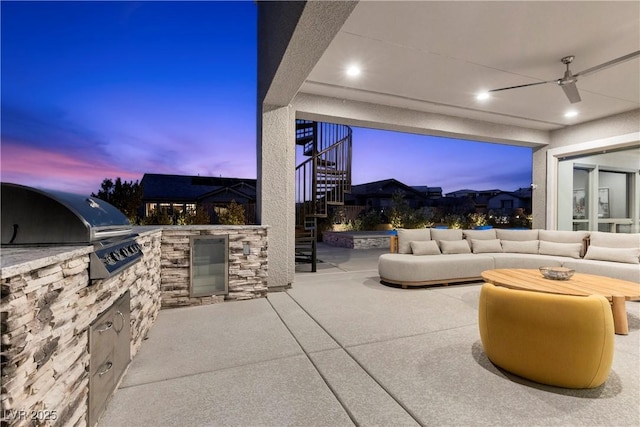 2890 Reverence Heights Ln, Las Vegas, NV 89138 - patio terrace at dusk featuring a patio, stairs, an outdoor living space, and a ceiling fan