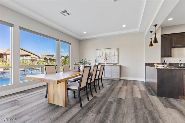 2890 Reverence Heights Ln, Las Vegas, NV 89138 - dining space featuring dark wood finished floors, baseboards, and recessed lighting