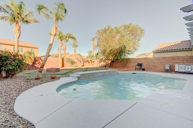 6826 Dovecote Ave, North Las Vegas, NV 89084 - view of swimming pool with a fenced backyard and a patio area