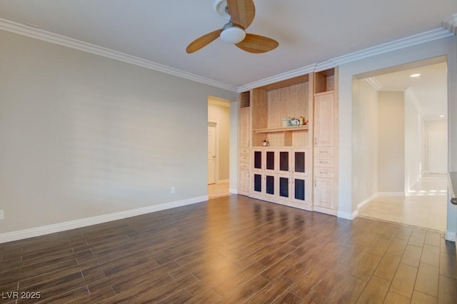 6826 Dovecote Ave, North Las Vegas, NV 89084 - unfurnished room featuring ceiling fan, dark wood finished floors, baseboards, and crown molding