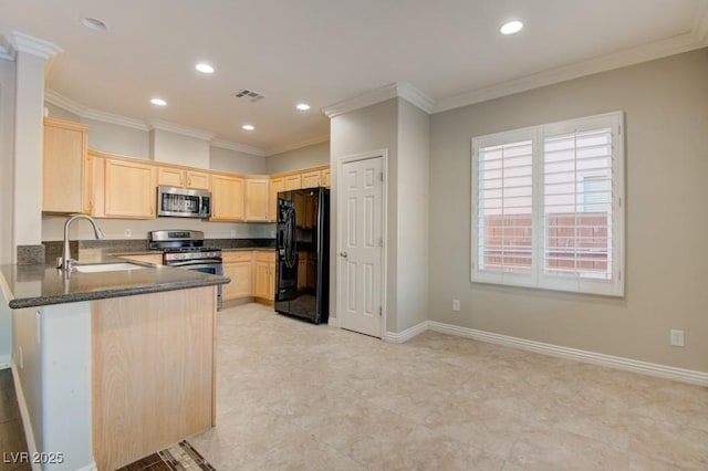 6826 Dovecote Ave, North Las Vegas, NV 89084 - kitchen with stainless steel appliances, light brown cabinetry, a sink, recessed lighting, and a peninsula