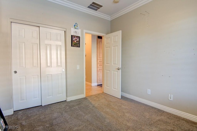 6826 Dovecote Ave, North Las Vegas, NV 89084 - unfurnished bedroom with carpet flooring, crown molding, a closet, and baseboards