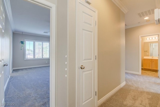 6826 Dovecote Ave, North Las Vegas, NV 89084 - hall with light carpet, ornamental molding, and baseboards