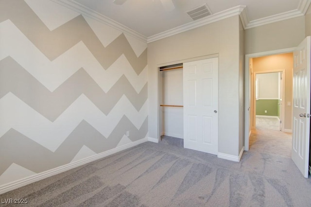 6826 Dovecote Ave, North Las Vegas, NV 89084 - unfurnished bedroom with carpet flooring, crown molding, baseboards, a closet, and a ceiling fan