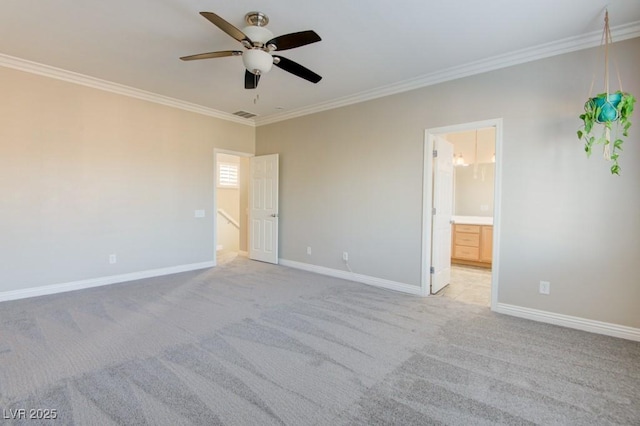 6826 Dovecote Ave, North Las Vegas, NV 89084 - unfurnished bedroom featuring crown molding, carpet floors, baseboards, ceiling fan, and connected bathroom