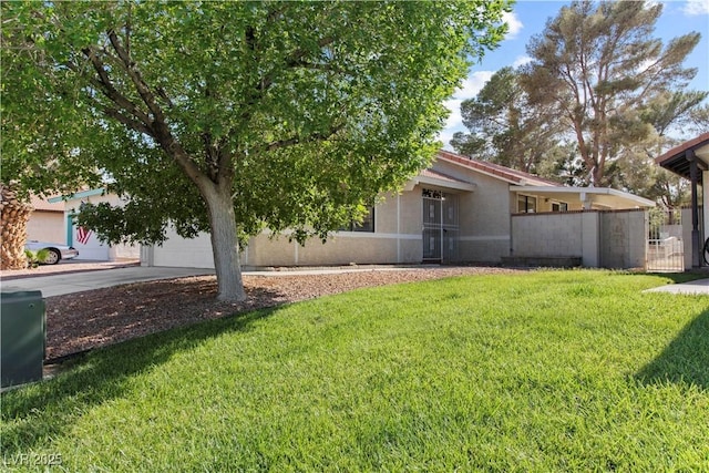 3936 Applecrest St, Las Vegas, NV 89108 - view of yard with concrete driveway and a garage