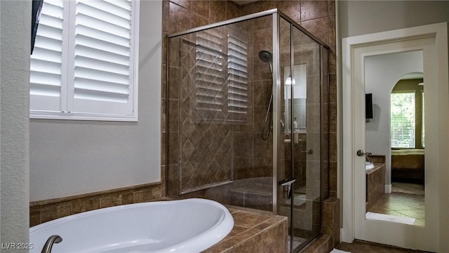 11731 Longworth Rd, Las Vegas, NV 89135 - bathroom featuring a garden tub and a shower stall
