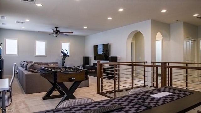 11731 Longworth Rd, Las Vegas, NV 89135 - rec room featuring recessed lighting, a ceiling fan, arched walkways, and light colored carpet