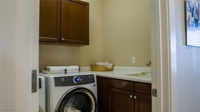 11731 Longworth Rd, Las Vegas, NV 89135 - laundry area with cabinet space and washing machine and dryer