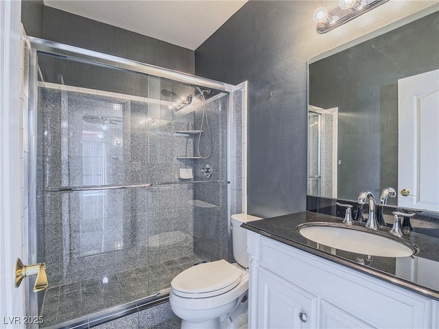 420 Dakar St, Henderson, NV 89015 - full bath with a shower stall, toilet, vanity, and a textured wall