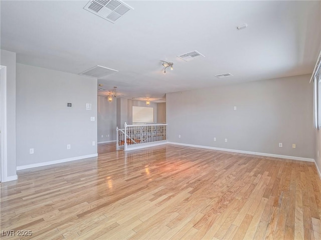 420 Dakar St, Henderson, NV 89015 - spare room with light wood-type flooring, baseboards, attic access, and ceiling fan