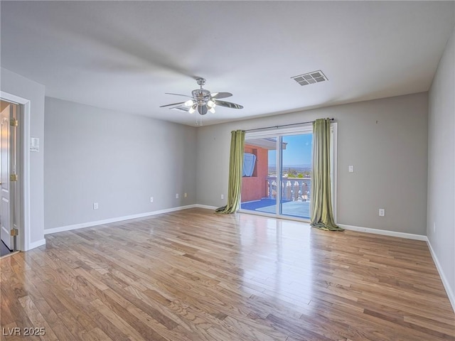420 Dakar St, Henderson, NV 89015 - spare room with a ceiling fan, wood finished floors, and baseboards