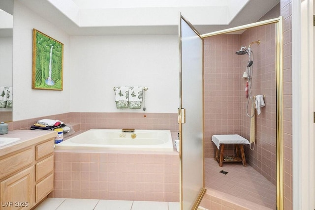 8236 Round Hills Cir, Las Vegas, NV 89113 - full bath with tile patterned flooring, a stall shower, a garden tub, and vanity