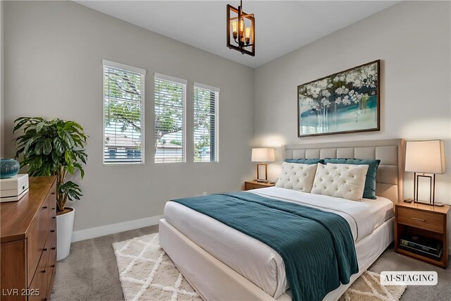 4829 E Beacon Ridge Dr, Pahrump, NV 89061 - bedroom with carpet floors, a chandelier, and baseboards