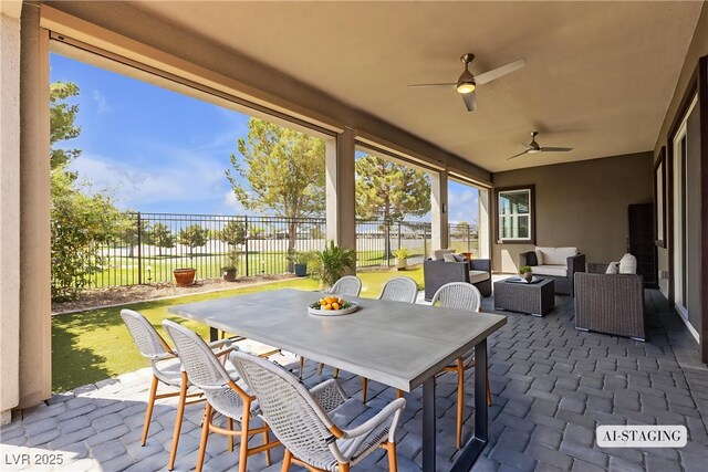 4829 E Beacon Ridge Dr, Pahrump, NV 89061 - view of patio / terrace with an outdoor living space, a ceiling fan, and outdoor dining area