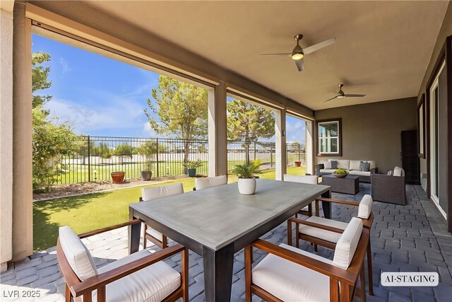 4829 E Beacon Ridge Dr, Pahrump, NV 89061 - view of patio / terrace featuring an outdoor hangout area, outdoor dining area, and a ceiling fan