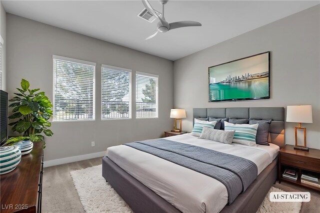 4829 E Beacon Ridge Dr, Pahrump, NV 89061 - carpeted bedroom with baseboards and a ceiling fan