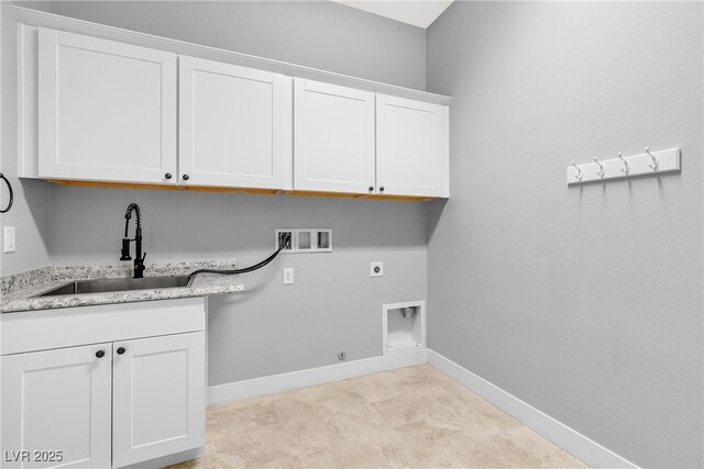 4829 E Beacon Ridge Dr, Pahrump, NV 89061 - laundry room featuring washer hookup, electric dryer hookup, cabinet space, baseboards, and hookup for a gas dryer